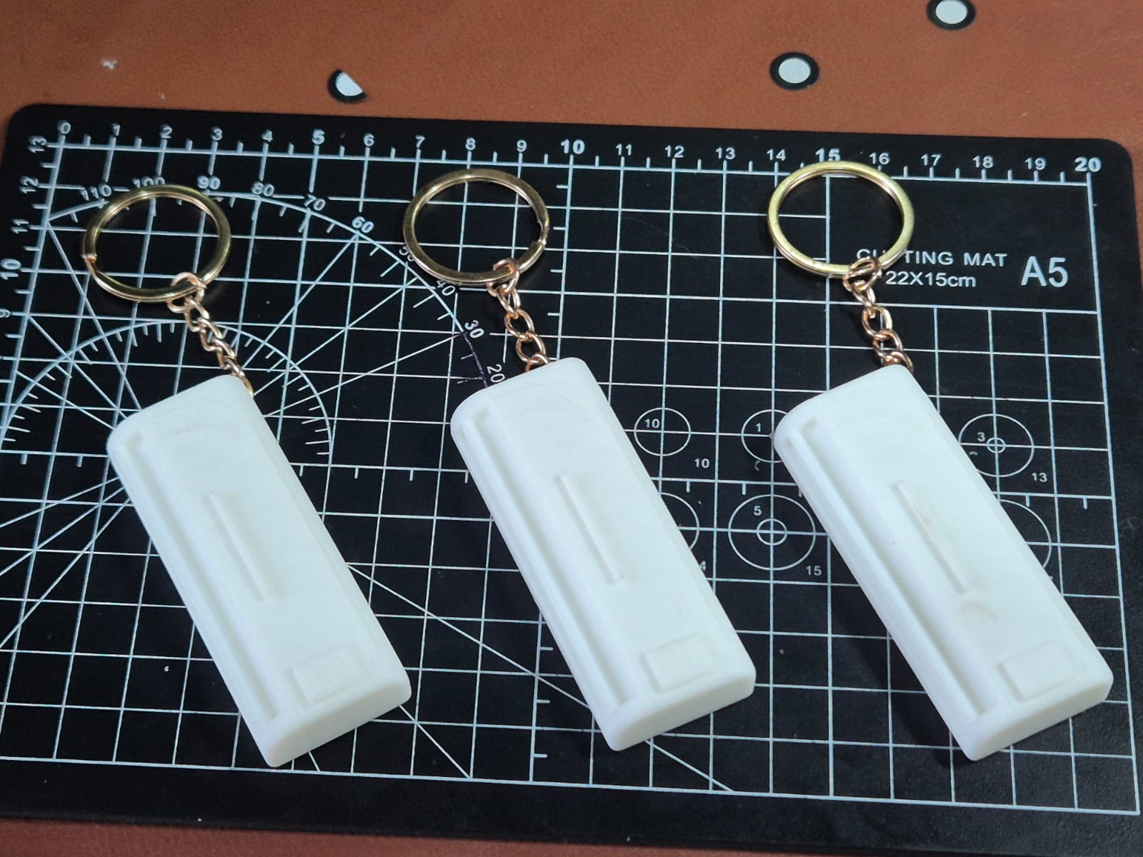 Chaveiros personalizados de mini split - detalhe